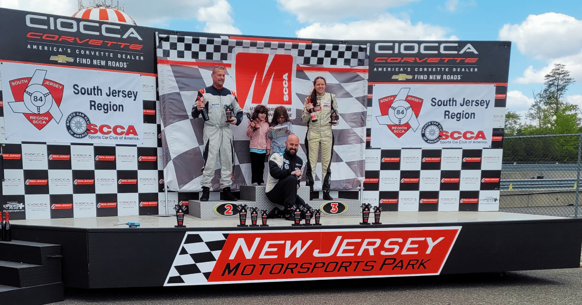 Danny Richardson and the No. 22 Camaro after the AS class win at Thunderbolt Raceway.